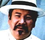 Peter Ustinov as Charlie Chan