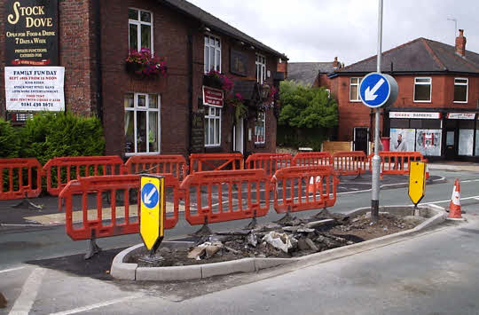 The rebuilt and redemolished and rebuilt traffic island, 2010/08/25